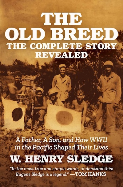 Cover of THE OLD BREED by W. Henry Sledge. Cover shows a sepia toned photograph of WWII soldiers in the Pacific Theatre holding up Japanese flags. 